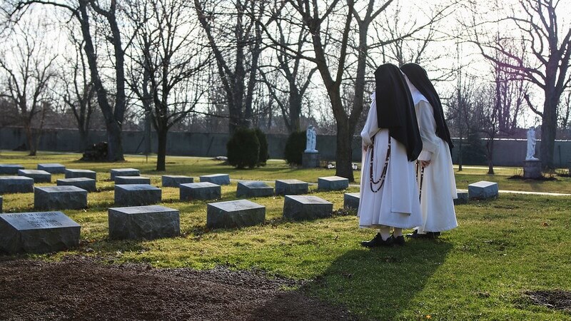 Nuns in a cemetery